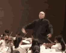 A conductor energetically leading an orchestra